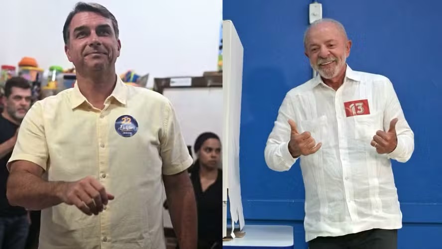 Flávio Bolsonaro (PL) e Lula (PT) votam neste segundo turno. — Foto: AFP